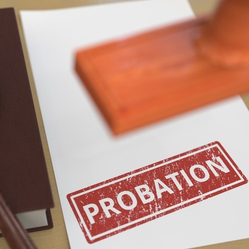 a piece of paper that says 'probation'